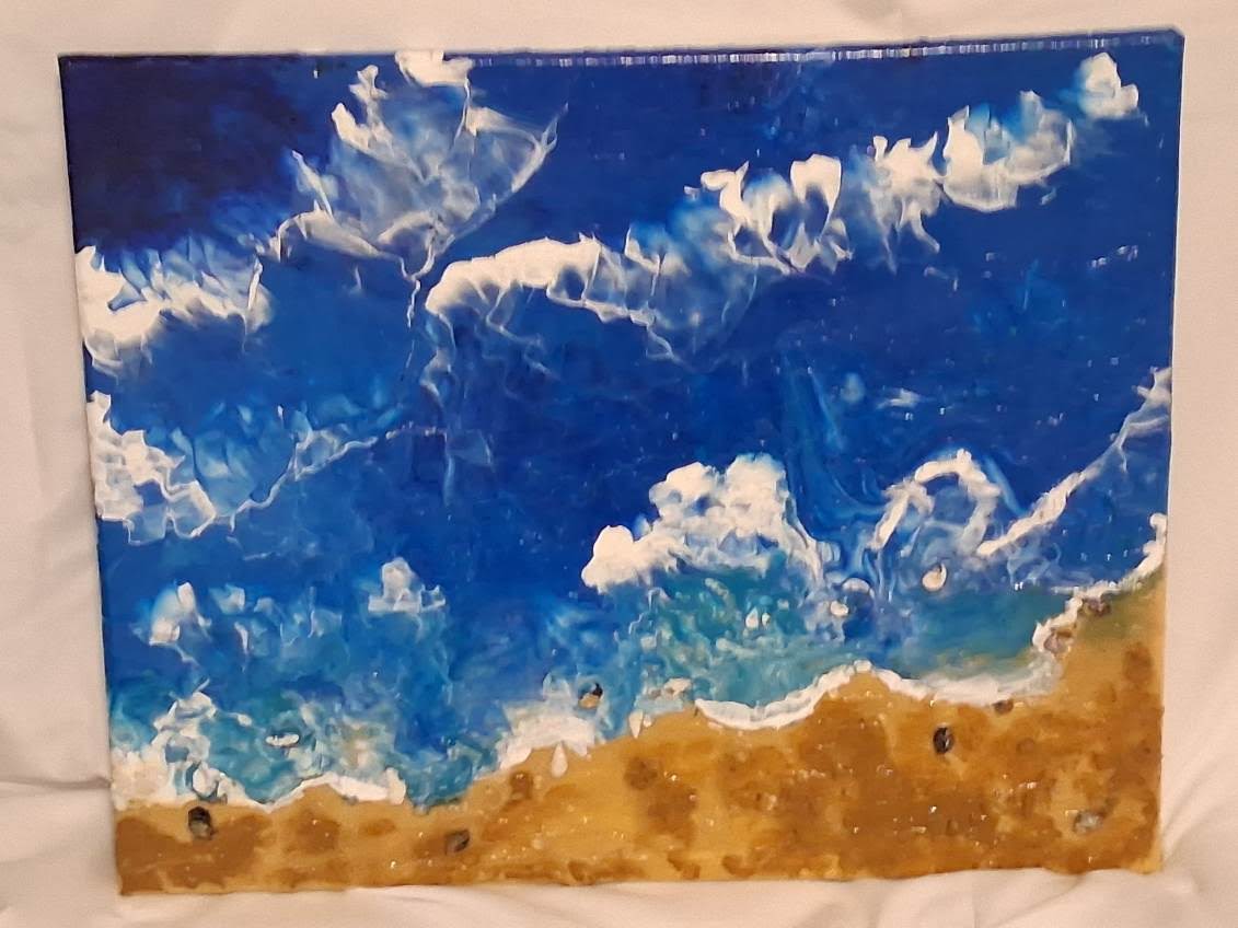 Blue and sand colored artwork with wave-like white texture